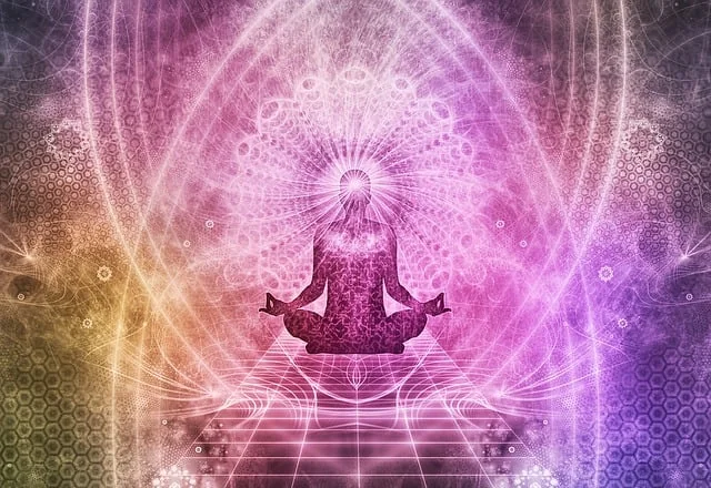 Illustration of awakening with meditating person, geometries and colors