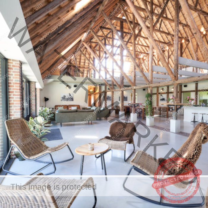 4 chairs, small wooden table in the middle, high wooden roof