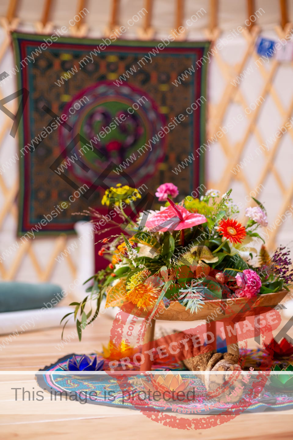 Colourful flower on small wooden table in ceremony room