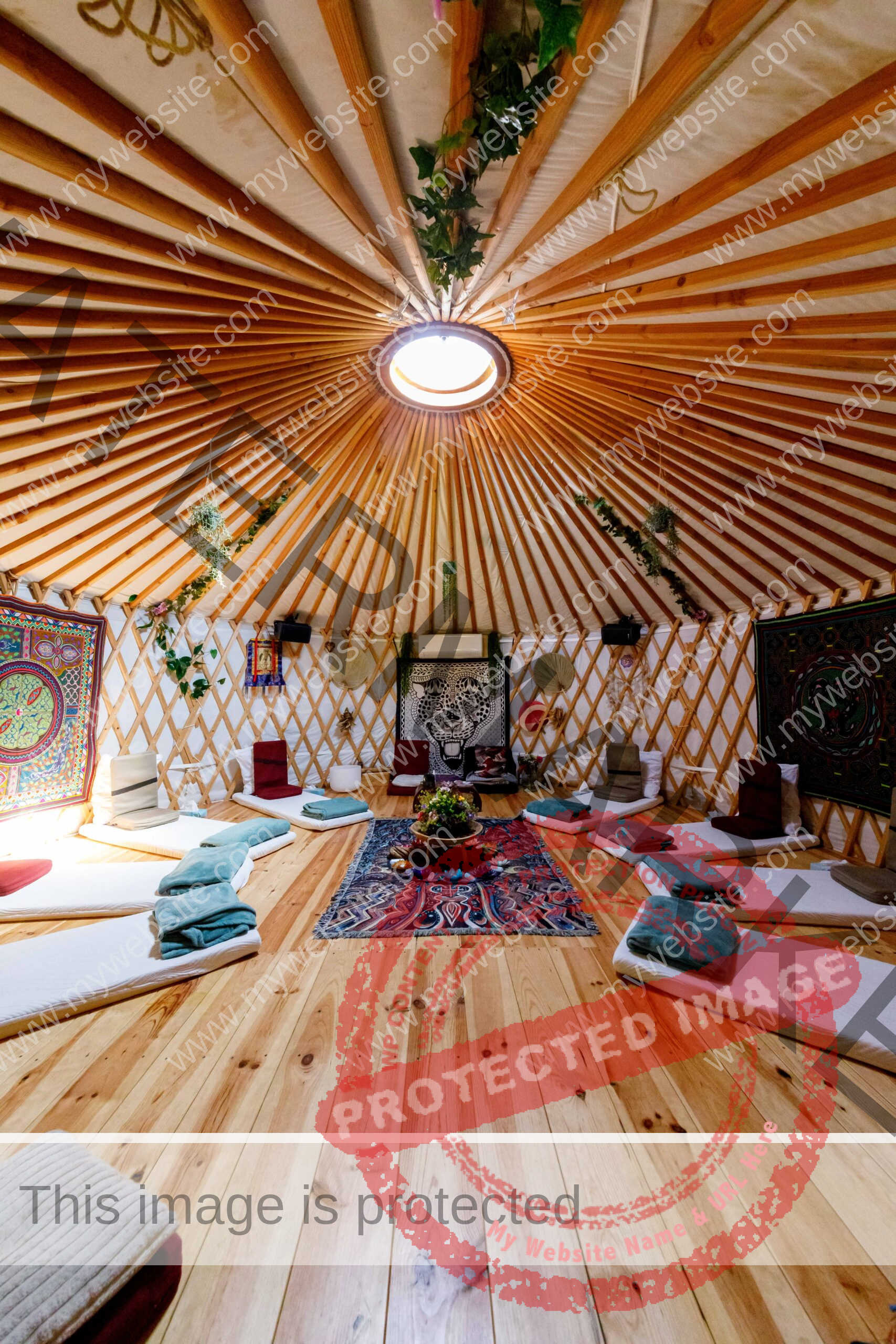 Ceremonial Yurt with wooden floor, mattresses, meditation seats and sealing with a window