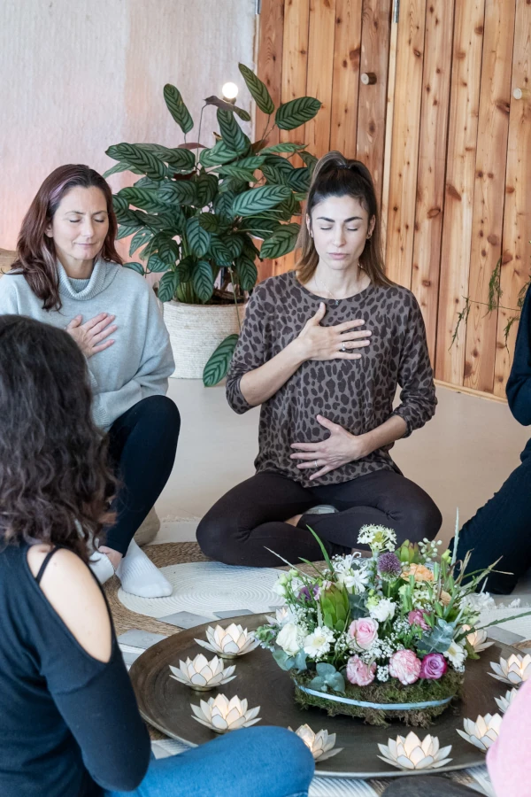 Women doing a ceremony and meditation