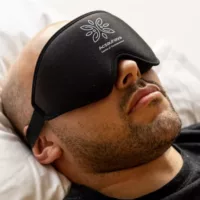 man with eyemask in a ceremony