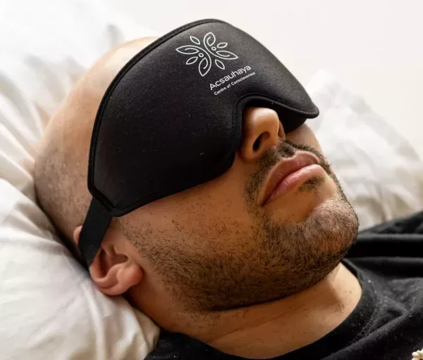 man with eyemask in a ceremony