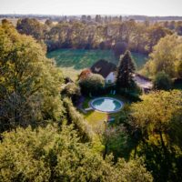 Cozy retreat house surrounded by nature, promoting a peaceful environment for healing