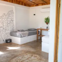 Private bungalow bedroom with two single beds and en-suite bathroom