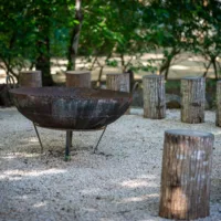 Fire pit with with many logs to sit