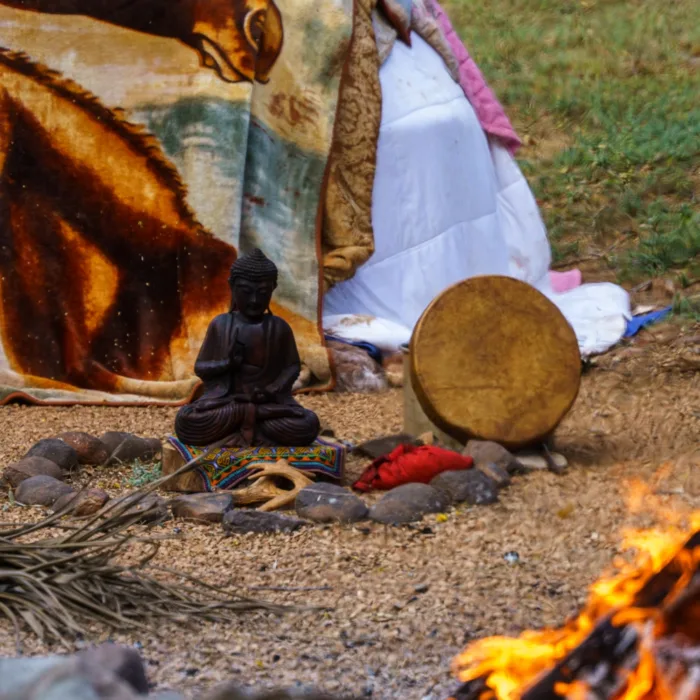 Sweat lodge, ritual altar and camp fire
