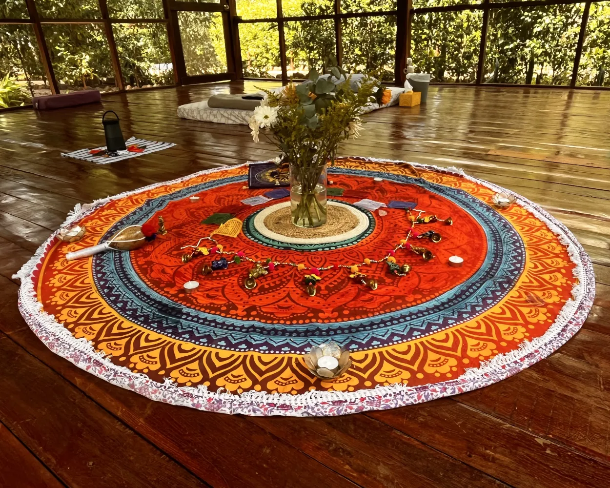 Ayahuasca Retreat Costa Rica, round and colorful altar with flowers