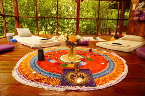 Private Ayahuasca Retreat Costa Rica, round colorful altar and two white mattresses